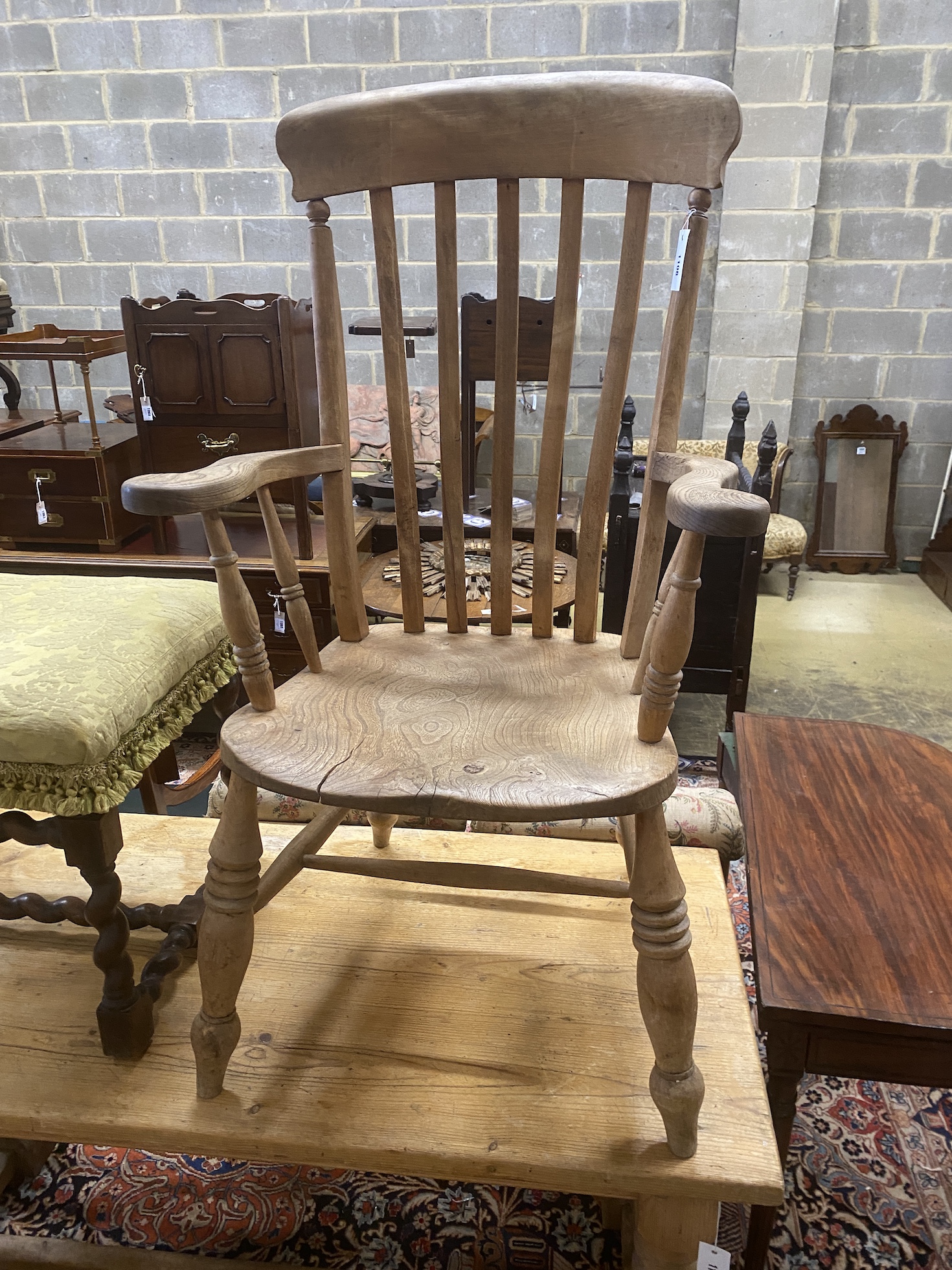 A Victorian elm and beech Windsor lathe back armchair, width 61cm, depth 49cm, height 113cm